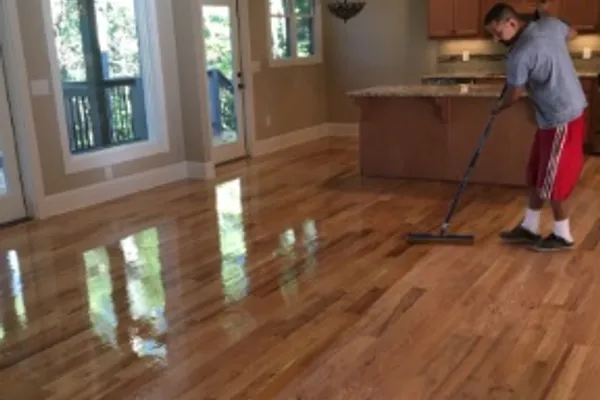 Hardwood floor refinishing in progress